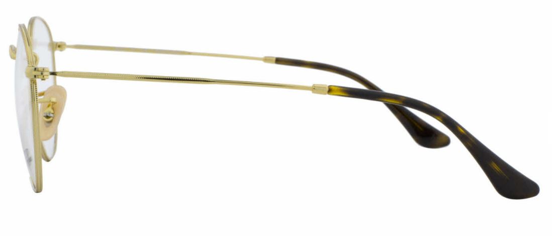 Close-up of thin, gold and black eyeglass temple tips.