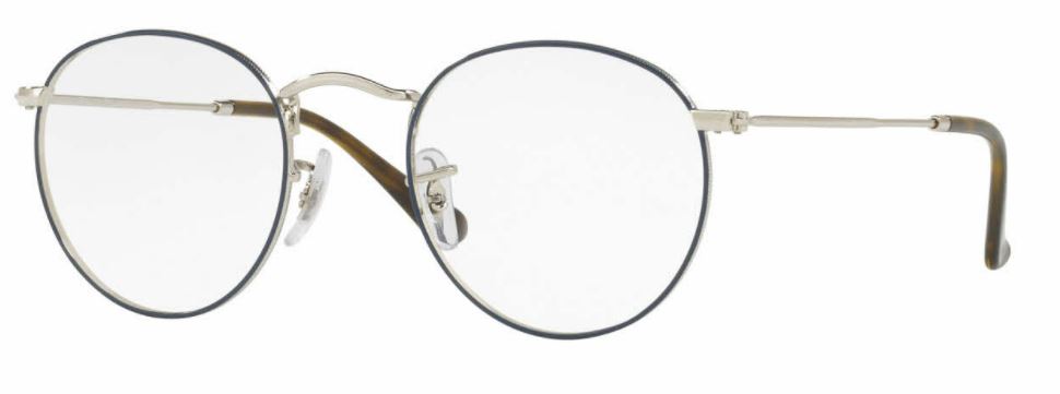 Close-up of a round eyeglass lens with a thin metal frame and adjustable nose pads.