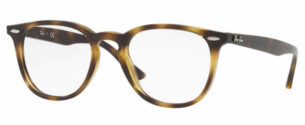 Close-up of brown tortoiseshell eyeglass frames without lenses.
